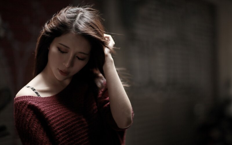 woman in red sweater