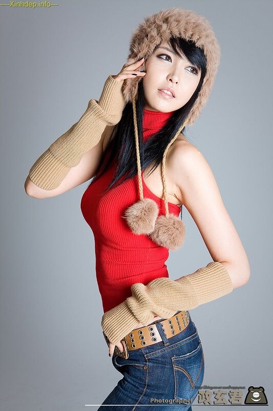 woman in red sweater and hat
