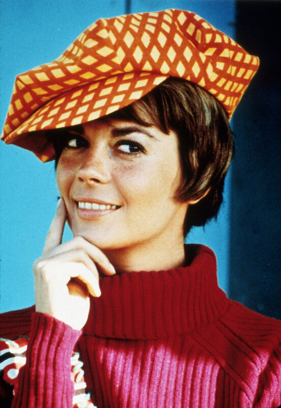 woman in red sweater and hat