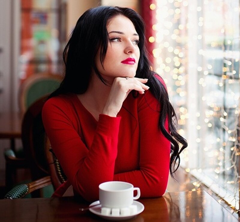 Woman in Red Sweater — Contemplative