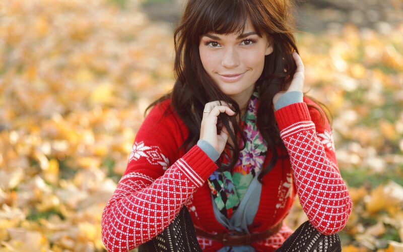 woman in red sweater outdoors