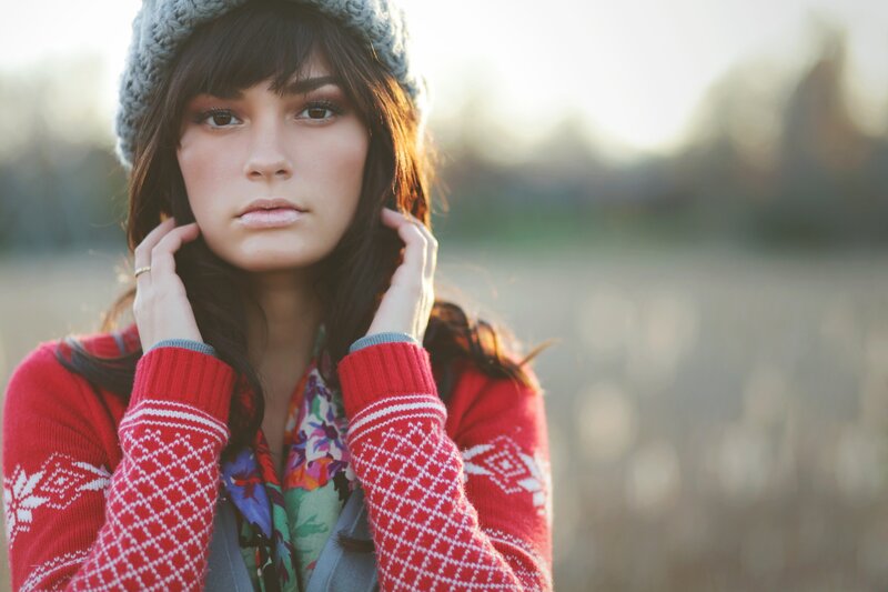 woman in red sweater outdoors