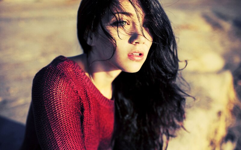 woman in red sweater outdoors