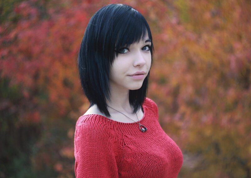 woman in red sweater outdoors