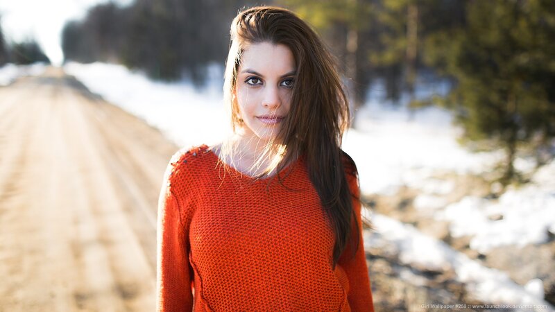woman in red sweater outdoors
