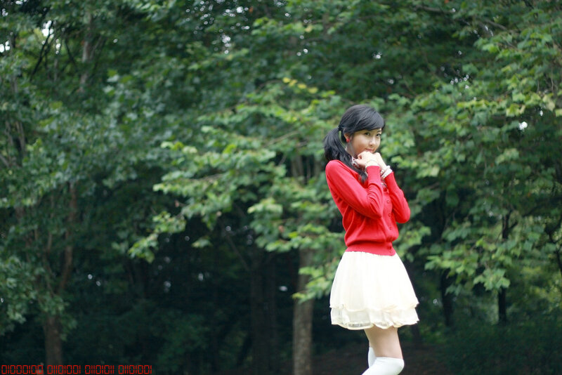 woman in red sweater outdoors