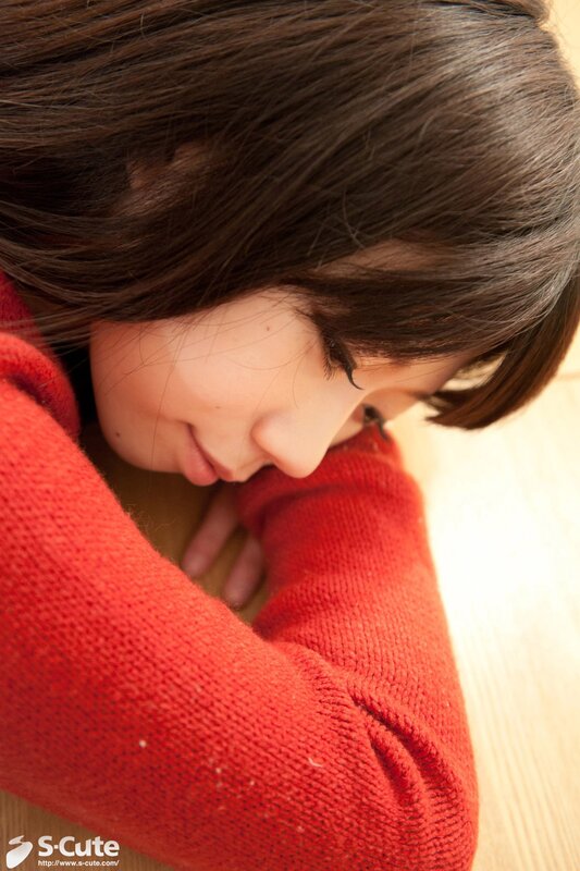 woman in red sweater resting