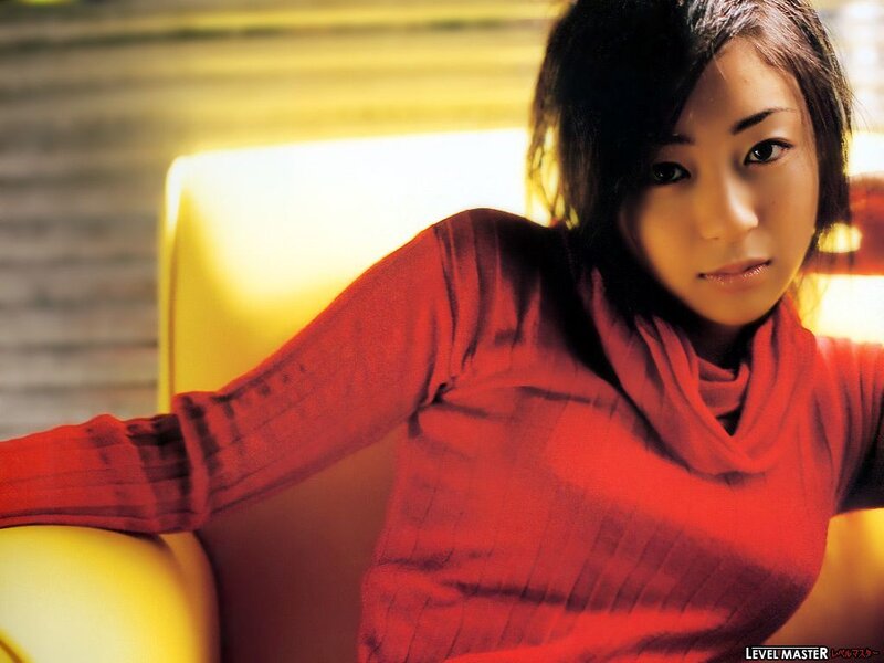 woman in red sweater sitting