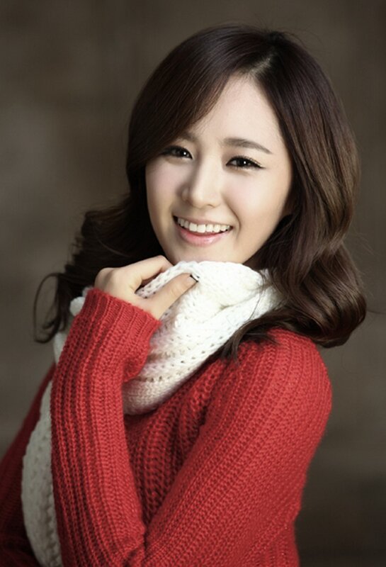 woman in red sweater smiling