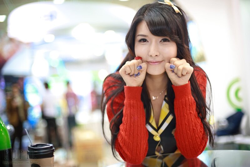 woman in red sweater smiling