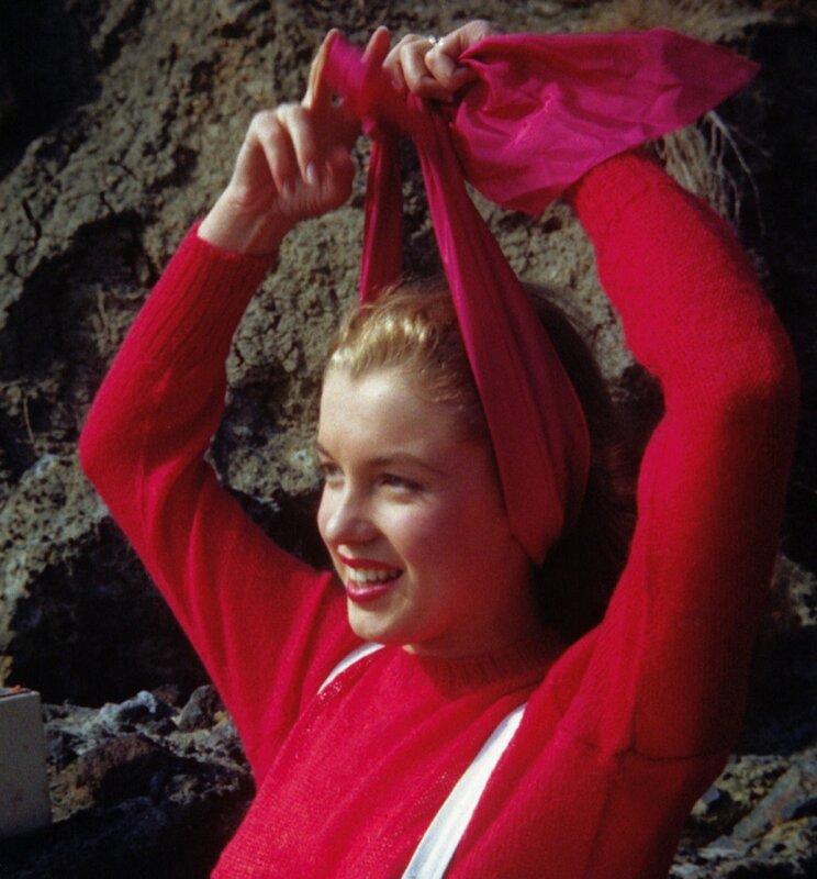 woman in red sweater smiling