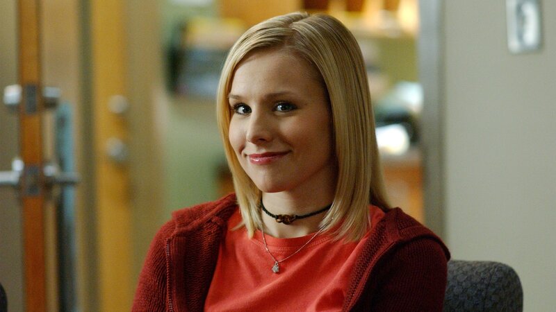woman in red sweater smiling