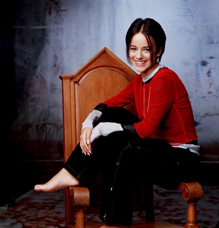 woman in red sweater smiling