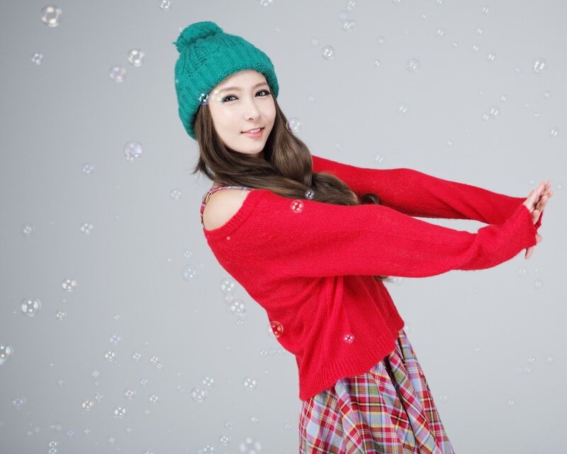 woman in red sweater with bubbles