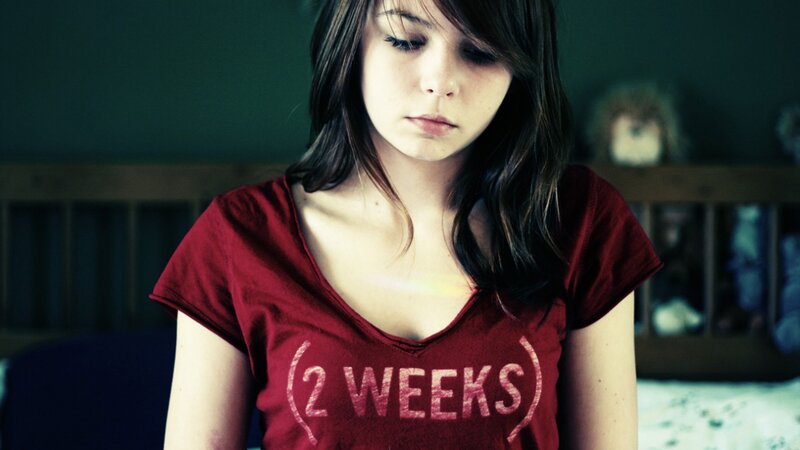 woman in red t-shirt