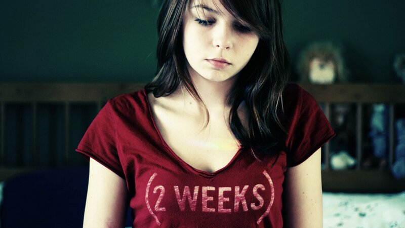 woman in red t-shirt