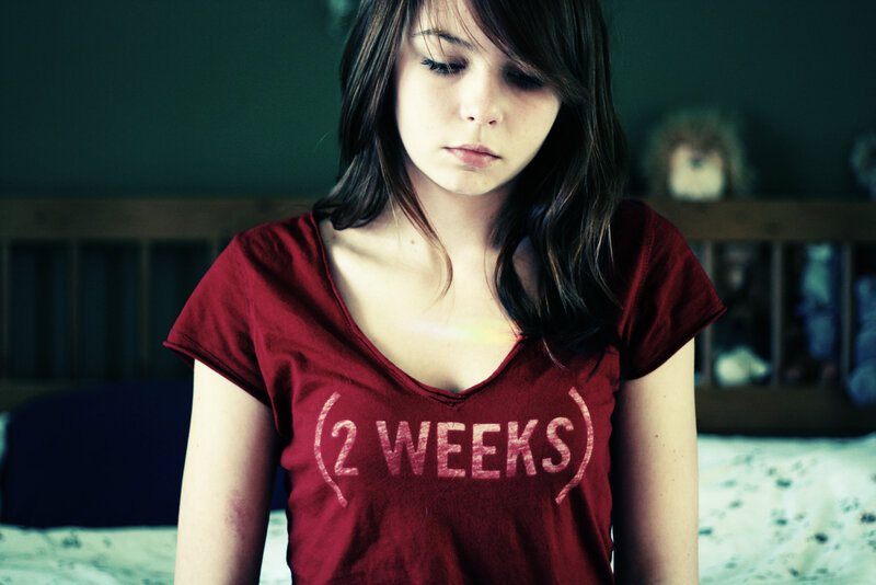 woman in red t-shirt