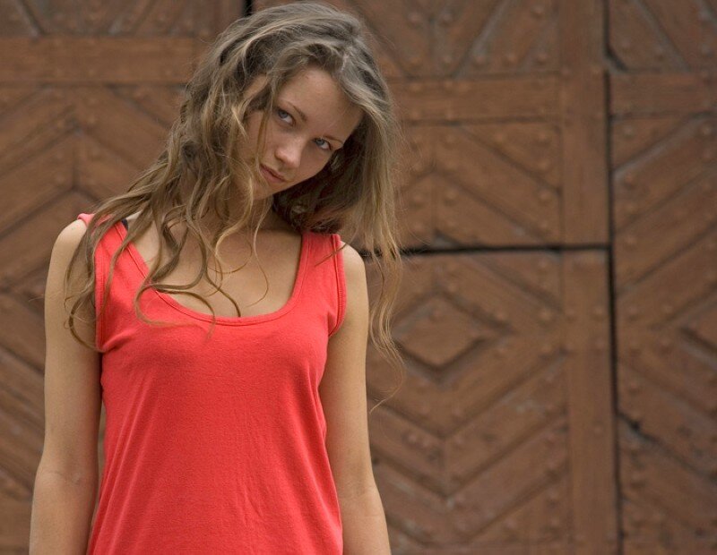 woman in red tank top