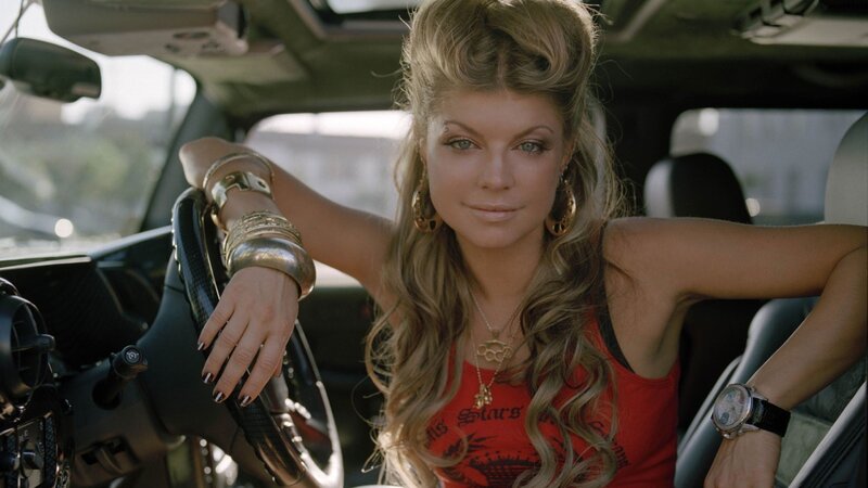 woman in red tank top inside car