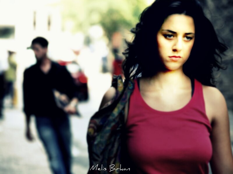 woman in red tank top walking