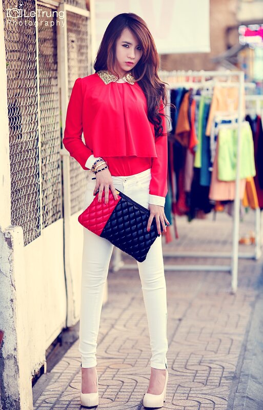 woman in red top and white pants