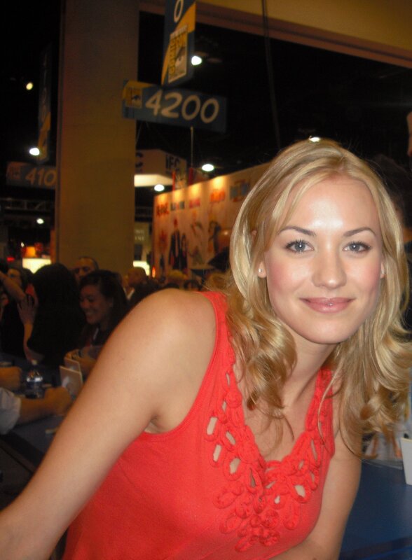 woman in red top at convention