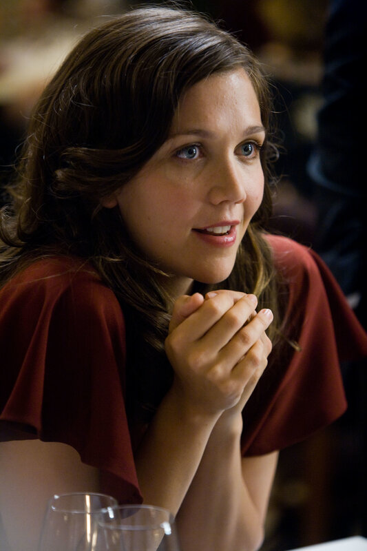 woman in red top at table