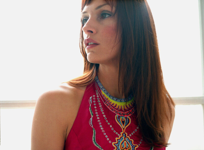 Woman in Red Top — Contemplative