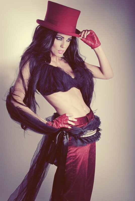 woman in red top hat and gloves
