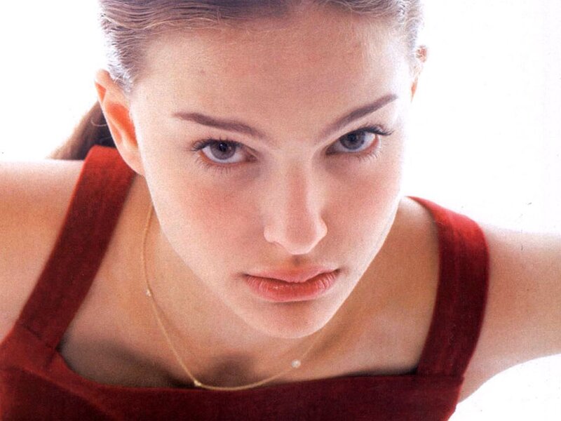 woman in red top looking up