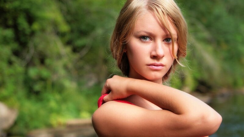 woman in red top outdoors