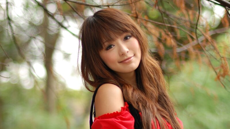 woman in red top outdoors