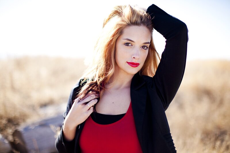 woman in red top outdoors