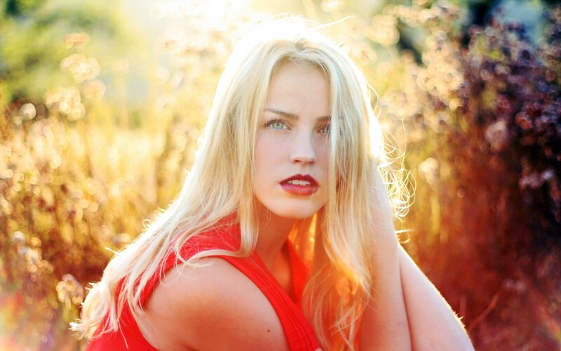 woman in red top outdoors