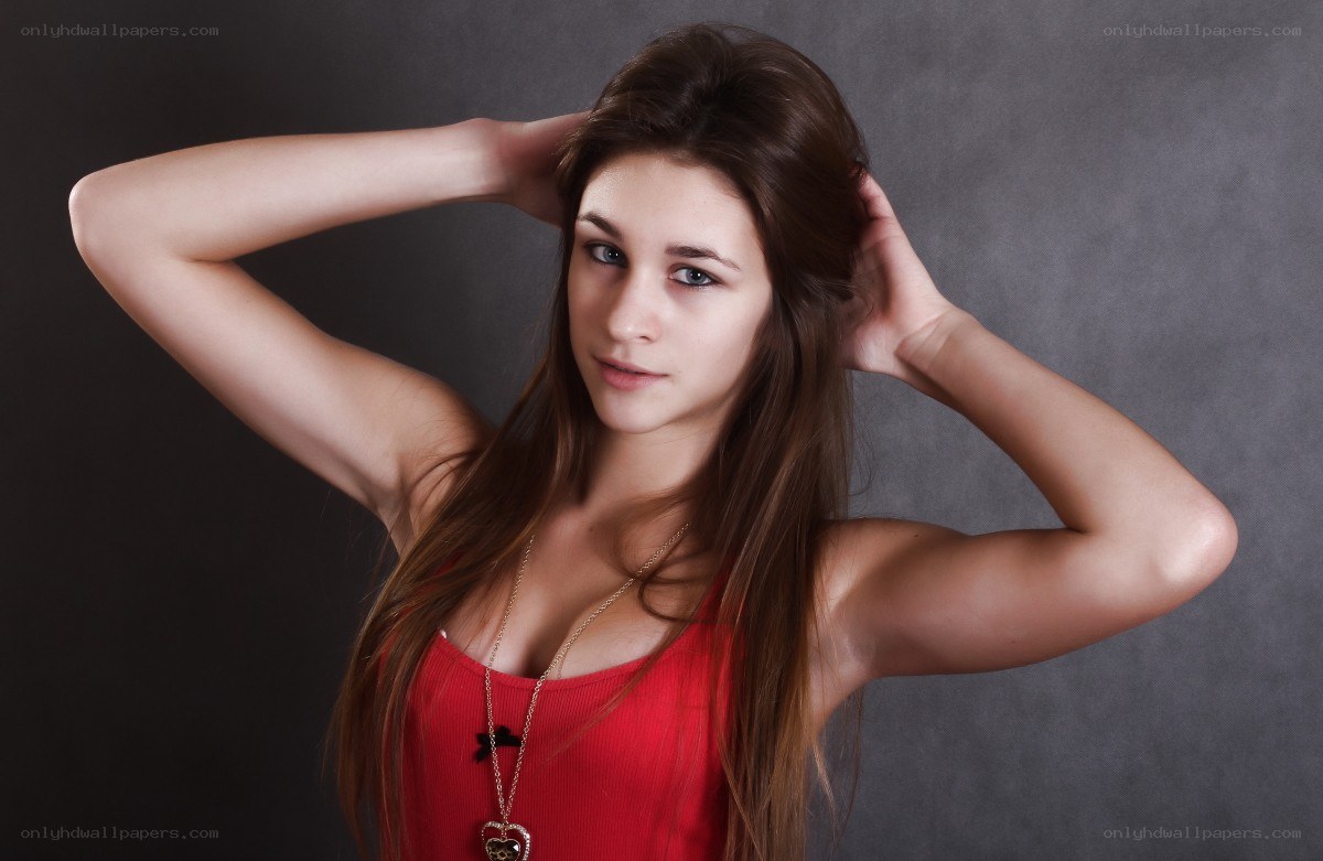 woman in red top posing
