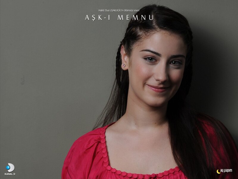 woman in red top smiling