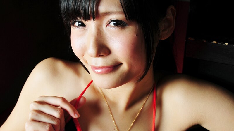 woman in red top smiling