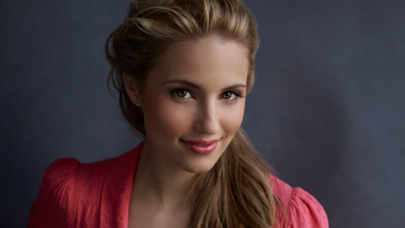 woman in red top smiling