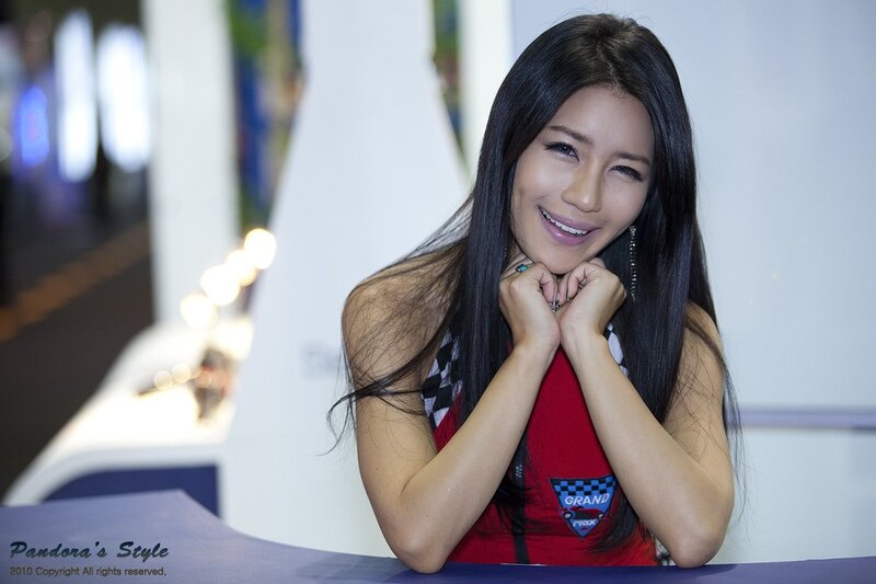 woman in red top smiling