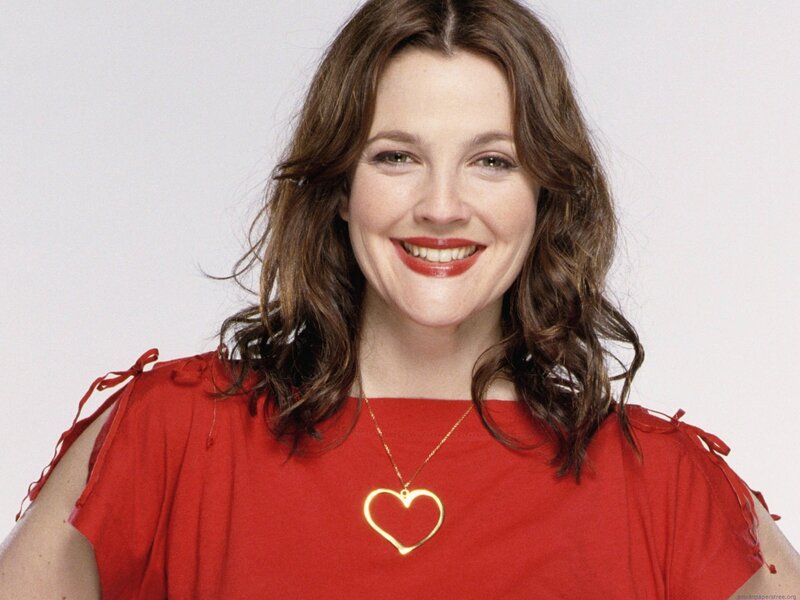 woman in red top smiling