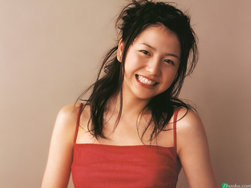 woman in red top smiling