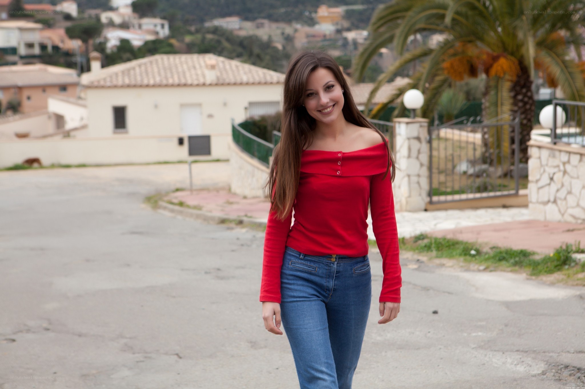 woman in red top walking
