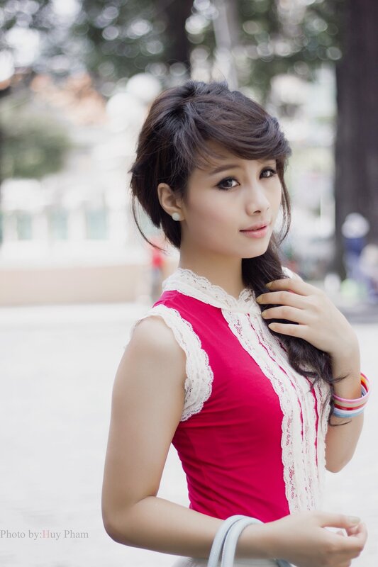 woman in red top with lace trim
