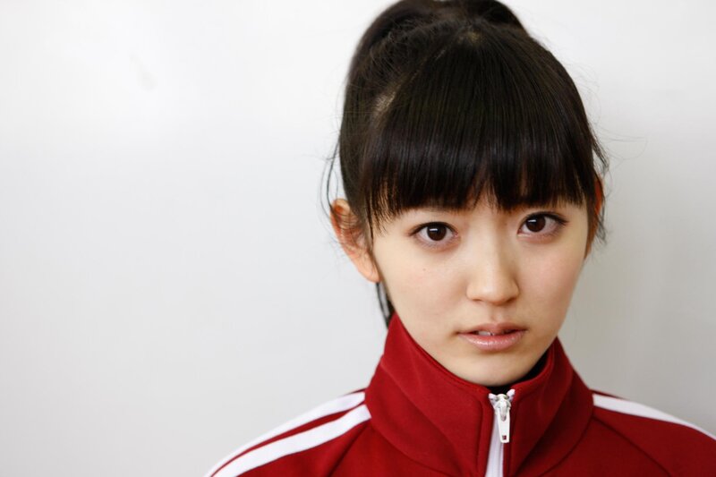 woman in red tracksuit