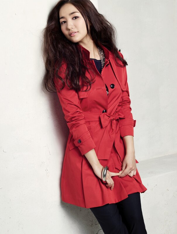 woman in red trench coat