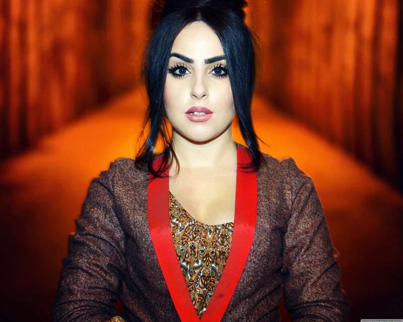 woman in red-trimmed jacket