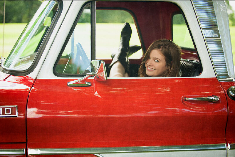 Woman in Red Truck