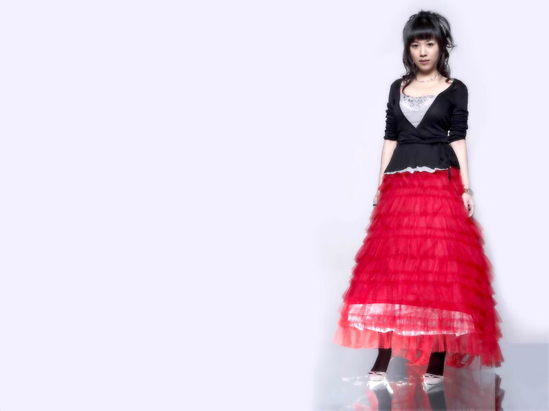 woman in red tulle skirt