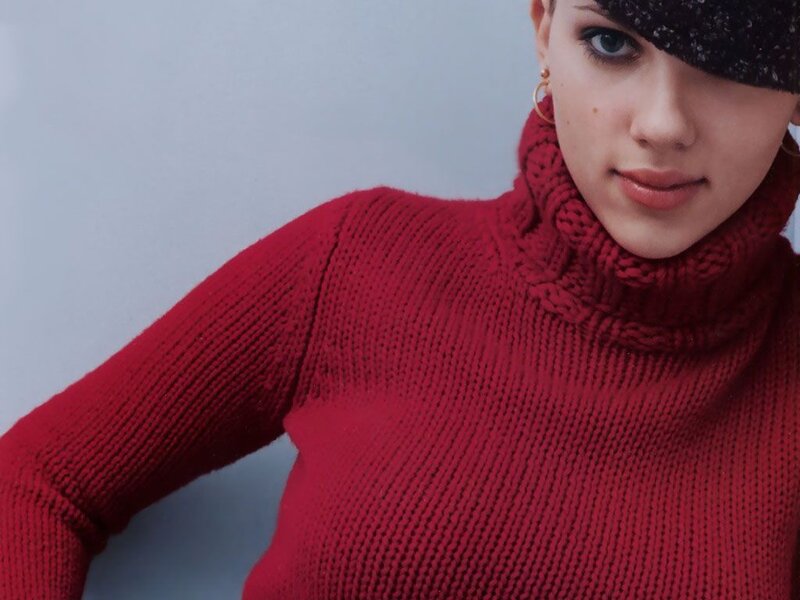 woman in red turtleneck sweater