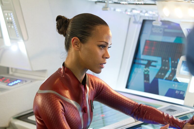 woman in red uniform on spaceship